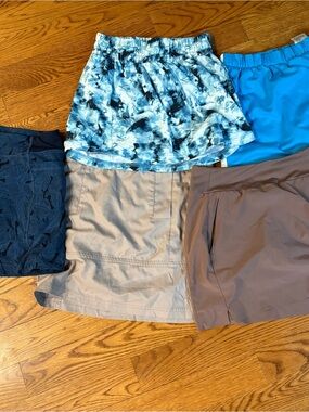 Mixed golf Skort & Skirt Lot - Blue Marble, Teal, Navy, Tan, Brown. XS And S